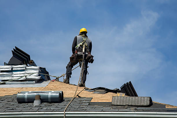 Professional Roof Replacement technician working in Morris, OK